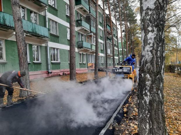 Почему на Морском проспекте асфальт кладут в лужи?